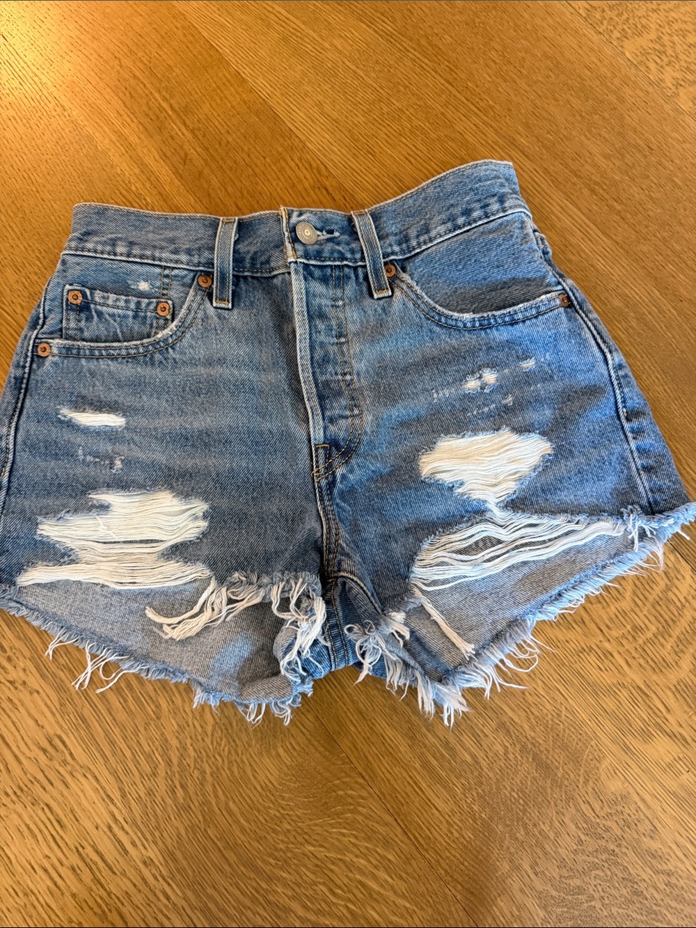 Levi's Distressed Light Blue Denim Cutoff Shorts